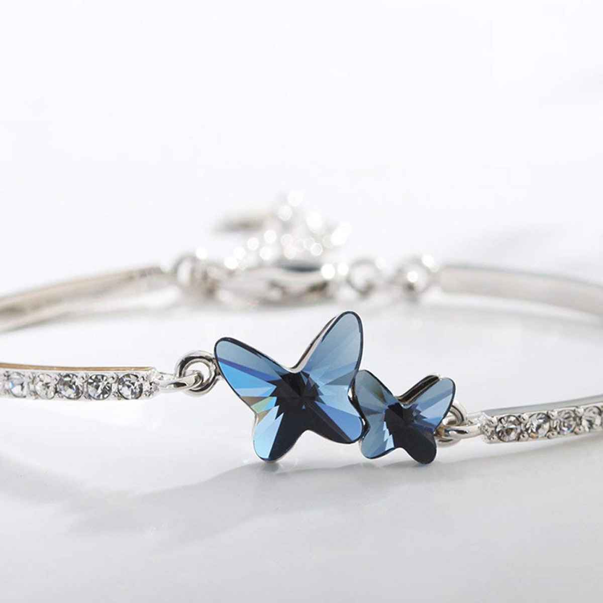 Shining Diva Fashion Stylish Crystal Platinum Plated Cubic Zirconia Bracelet for Women | Vg10958b