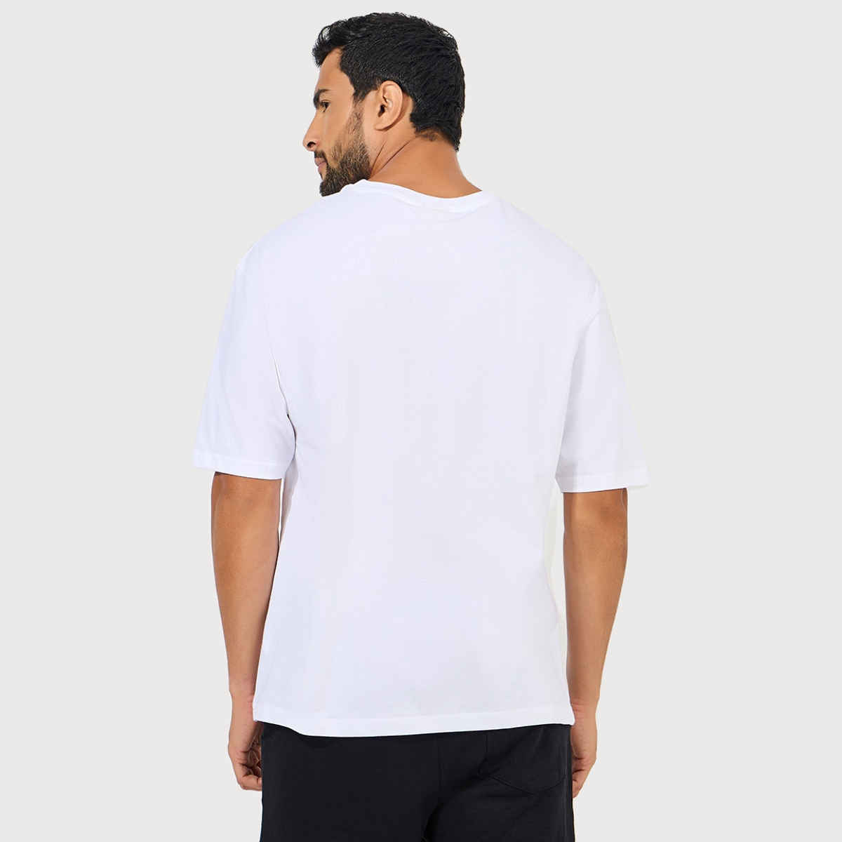 Styli Men's Oversized Tee with Snoopy Chest Graphic Print | White - XL