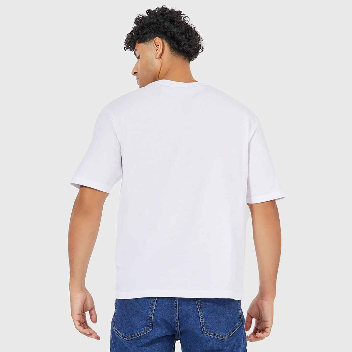 Styli Men's Oversized Tee with Nirvana Graphic Sticker Print in Compact Jersey | White - XL