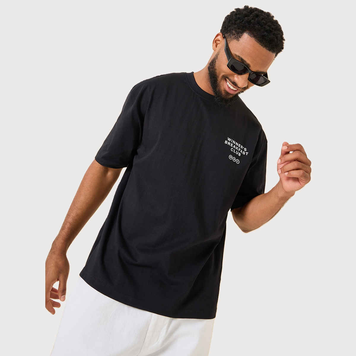 Styli Men's Oversized Fit Tee with Breakfast Graphic in Compact Cotton Jersey | Black - S
