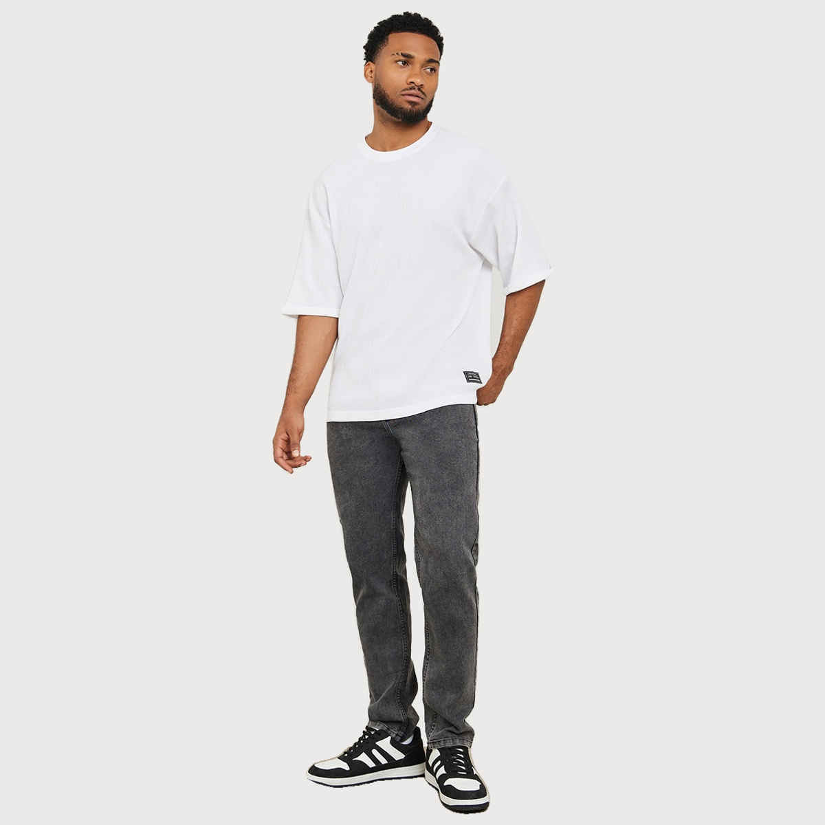 Styli Men's Waffle Knit Oversized T-shirt with Turn Up Sleeve | White - XL