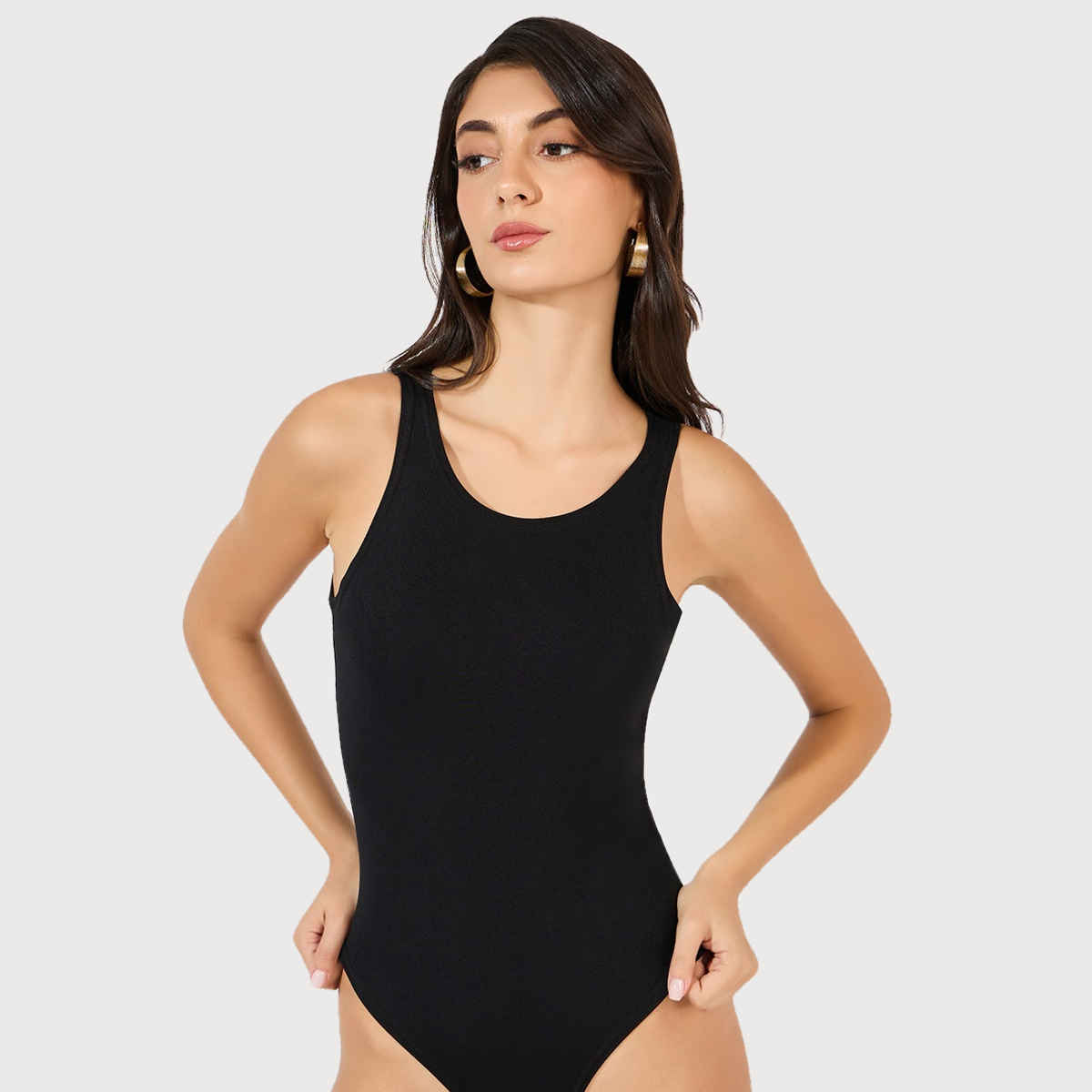 Styli Women's Ribbed Knit Fitted Bodysuit with Solid Design | Black - M