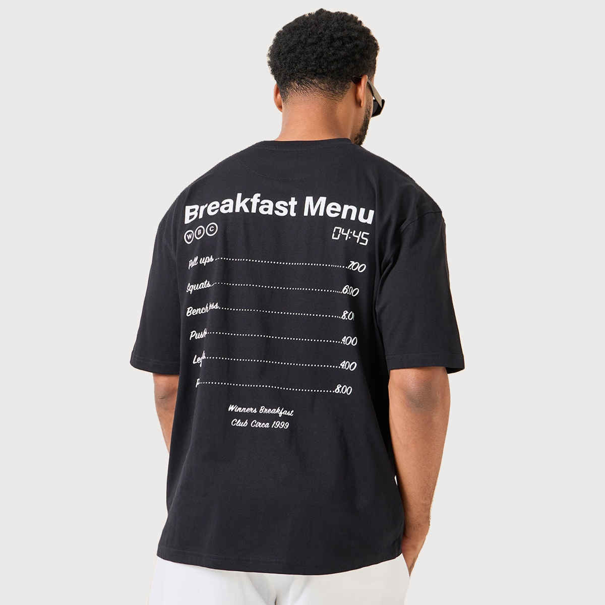 Styli Men's Oversized Fit Tee with Breakfast Graphic in Compact Cotton Jersey | Black - S
