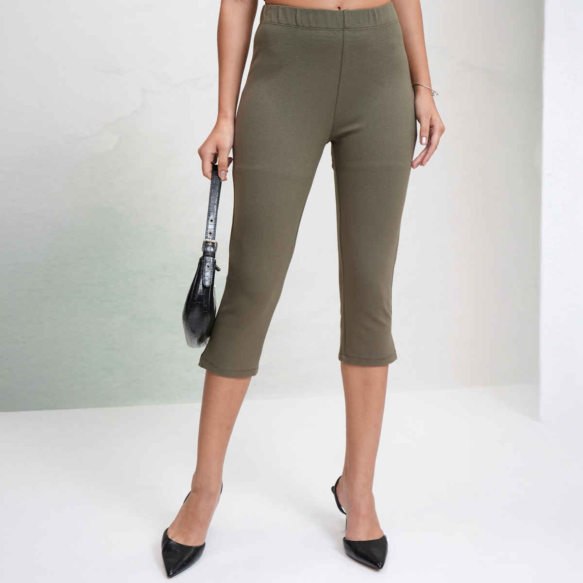Tokyo Talkies Women's Solid Stretchy Capri Pants with Slits | Olive - 32