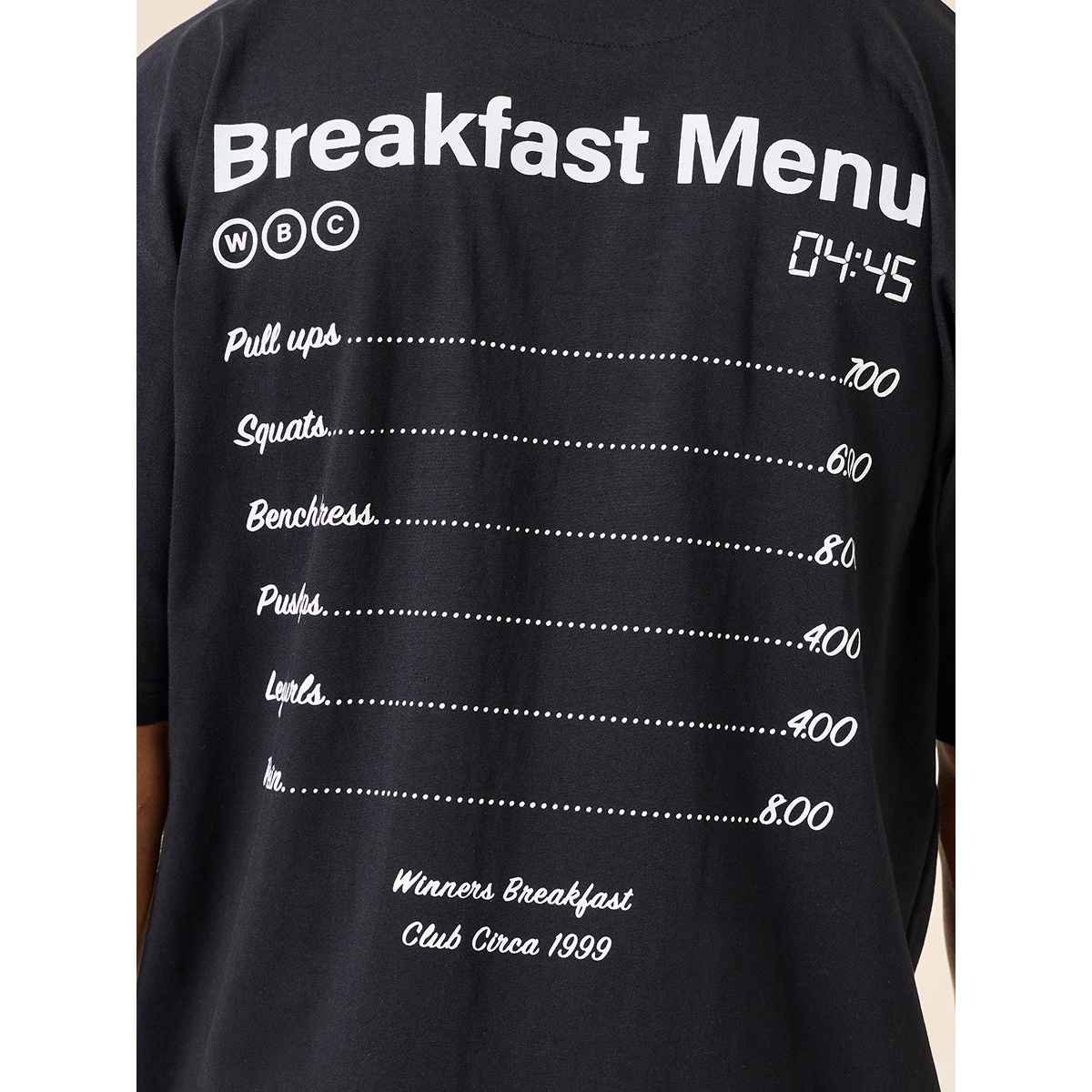 Styli Men's Oversized Fit Tee with Breakfast Graphic in Compact Cotton Jersey | Black - S