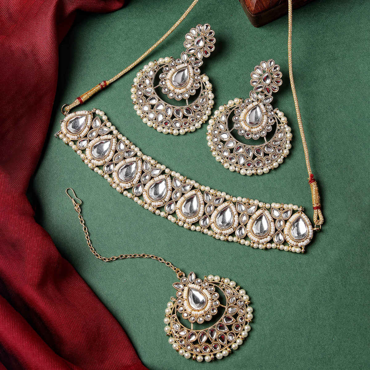 Sukkhi Fashionable Gold Plated White Kundan & Beads Studded Choker Necklace Set