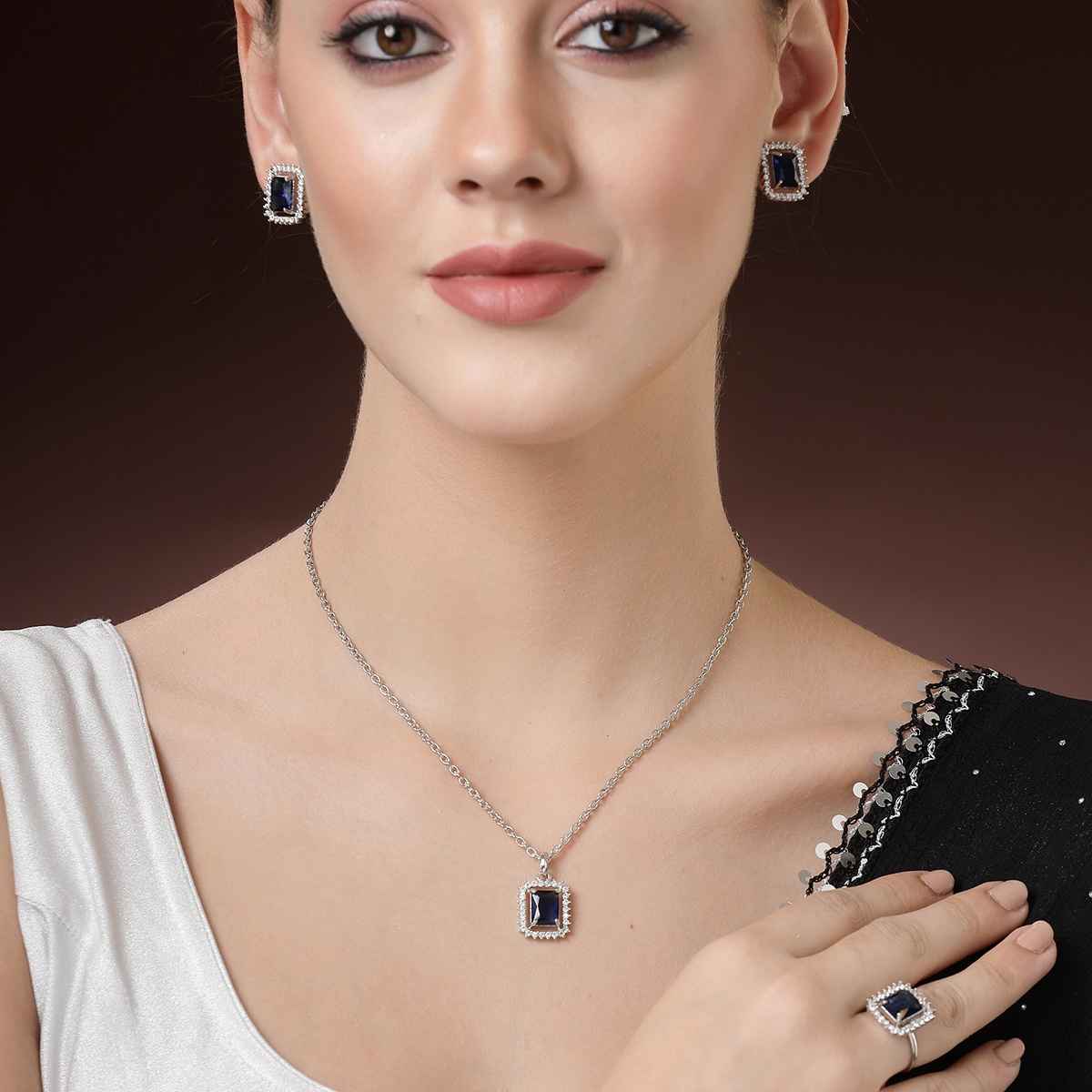 Zeneme Rhodium Plated AD Studded Princess Cut Crytsal Blue Necklace Earrings & Ring For Women