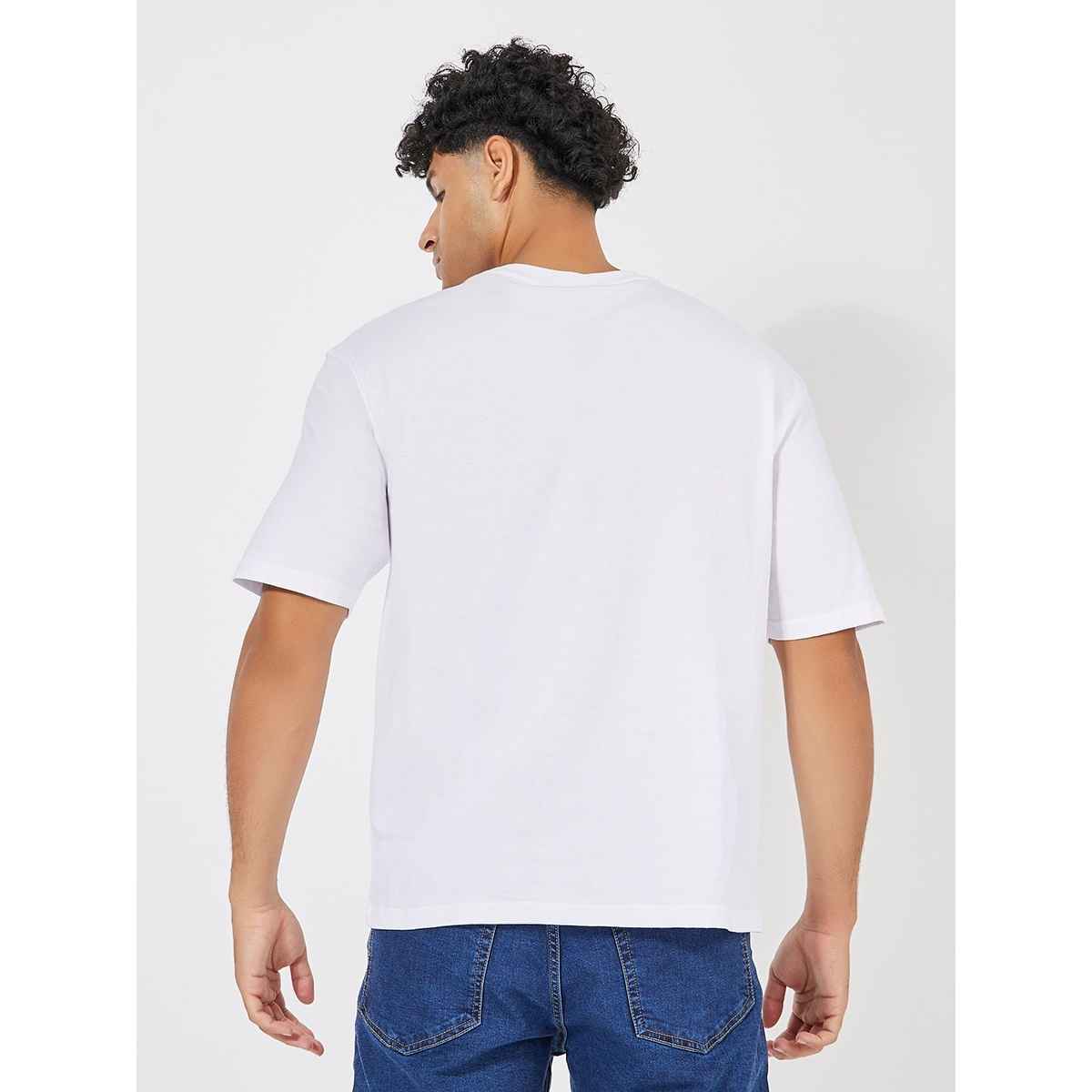 Styli Men's Oversized Tee with Nirvana Graphic Sticker Print in Compact Jersey | White - L