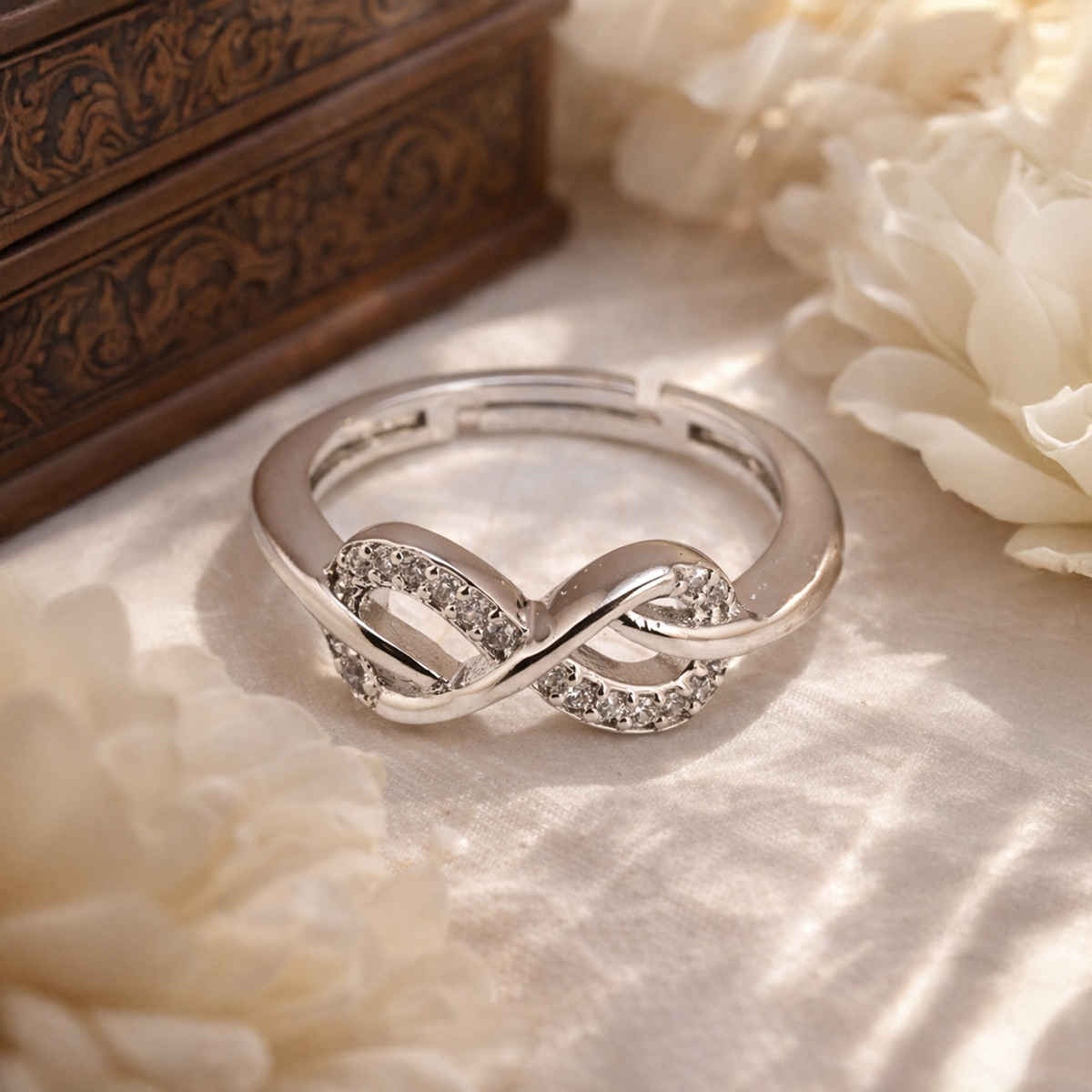 Sukkhi Latest Rhodium Plated CZ Infinity Valentine Finger Ring for Women|Free Size|LR116220