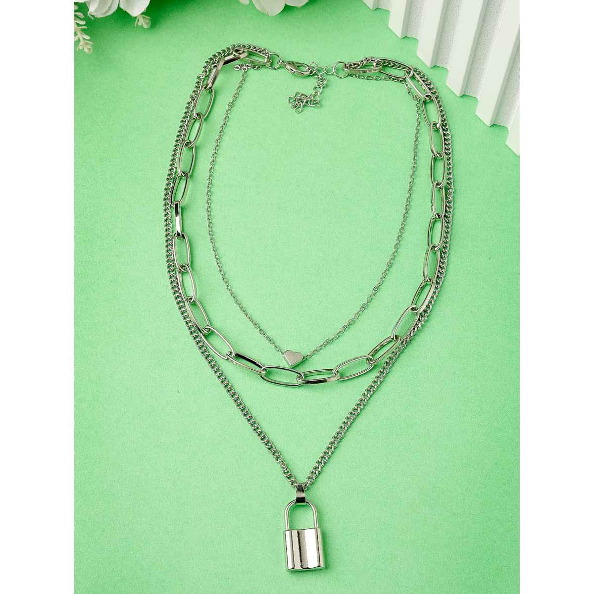 Scintillare By Sukkhi Western Style Rhodium Plated Silver Heart Lock Pendant Necklace