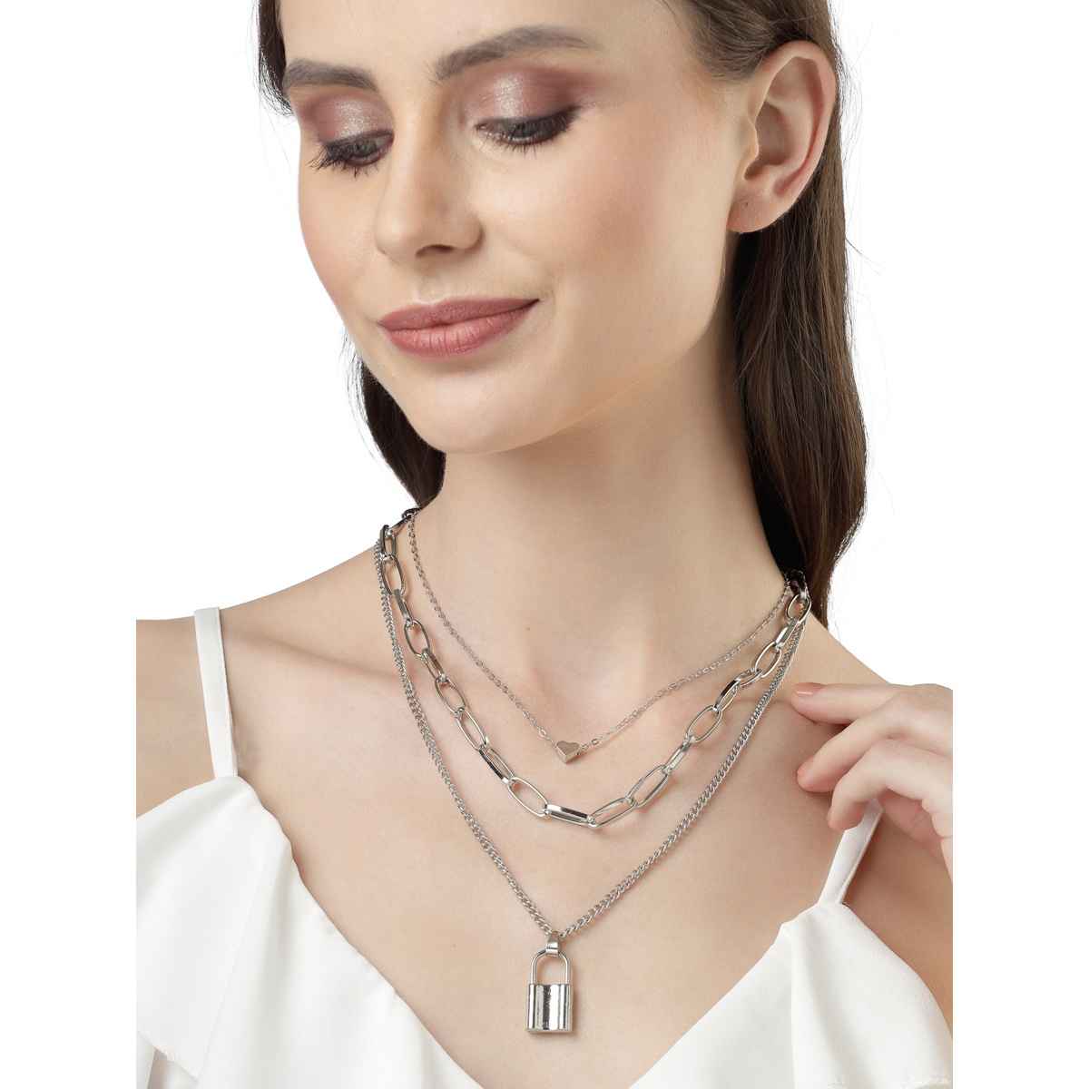 Scintillare By Sukkhi Western Style Rhodium Plated Silver Heart Lock Pendant Necklace