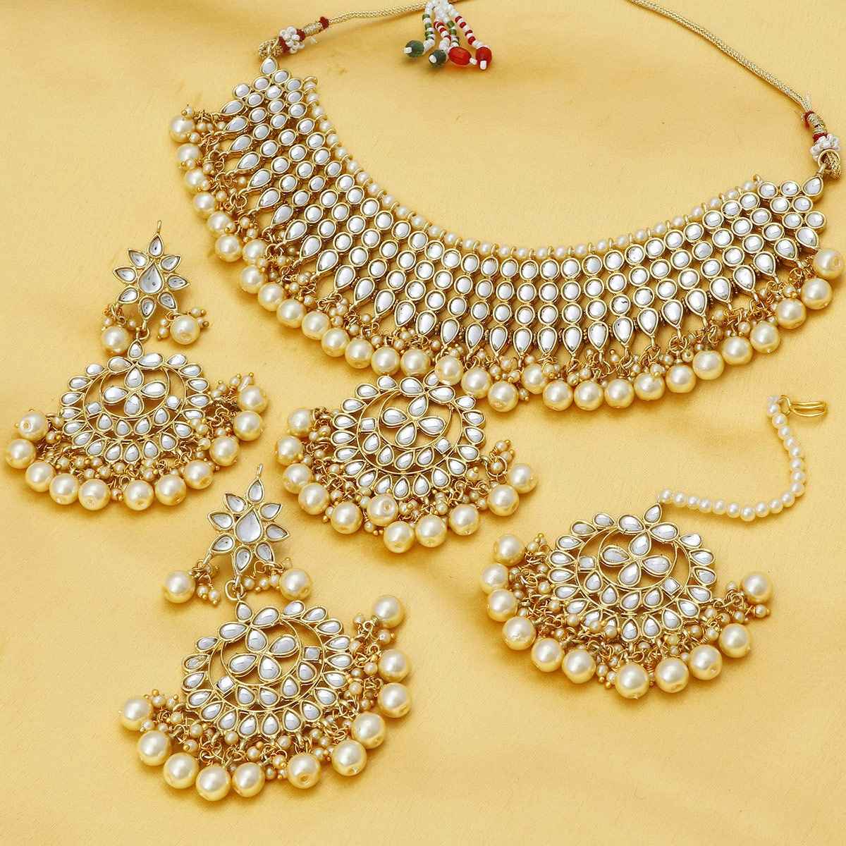 Sukkhi Trendy Kundan Gold Plated Pearl Choker Necklace Set For Women