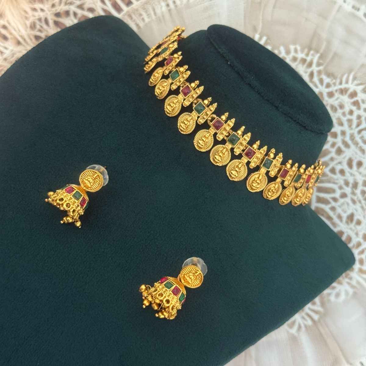 The Opal Factory Choker Necklace Set Laxmi Coin Motifs | Red and Green Stone Work & Jhumki Earrings