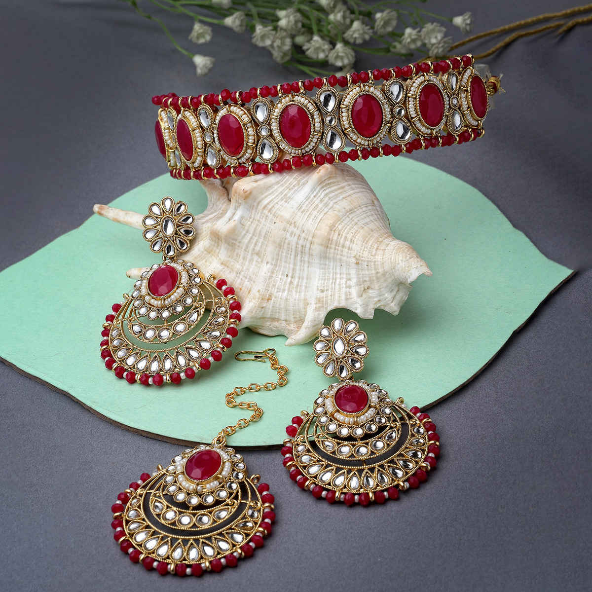 Sukkhi Affordable Gold Plated Rani Pink Stone & Beads Studded Choker Necklace Set