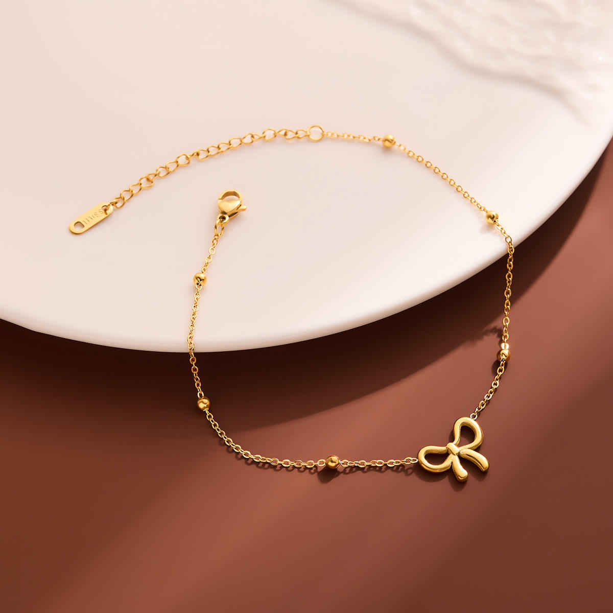 Beautynx Golden Bow Anti tarnish Bracelet | BNX-BR-0004 - Gold