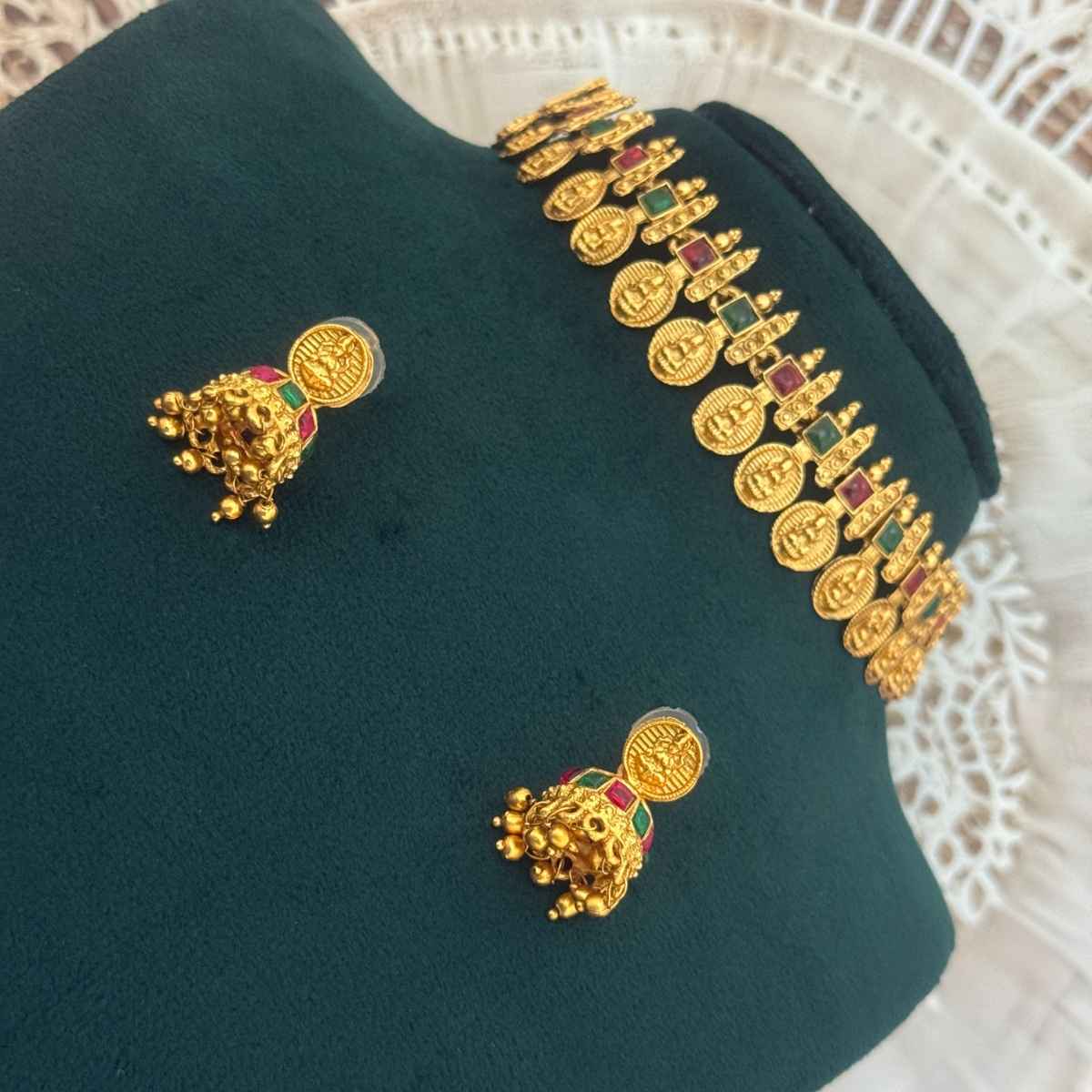 The Opal Factory Choker Necklace Set Laxmi Coin Motifs | Red and Green Stone Work & Jhumki Earrings