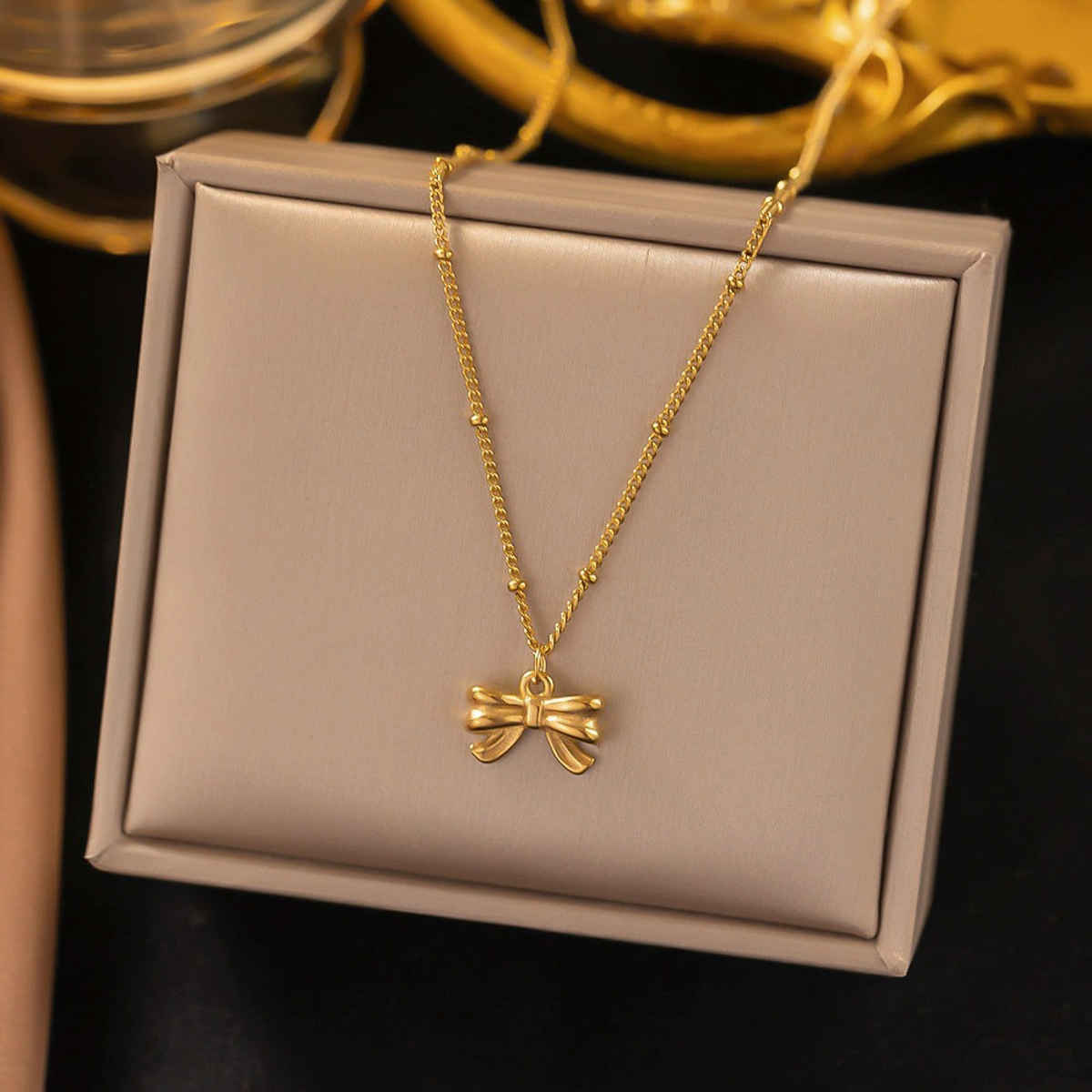 LabelShe Gold Plated Stainless Steel Bow Themed Pendant | LS-PS-26455