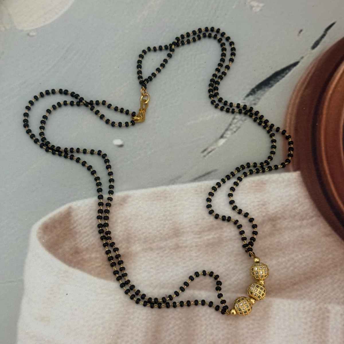 The Opal Factory Mangalsutra Double Line Golden Round Beads Pendant | Gold