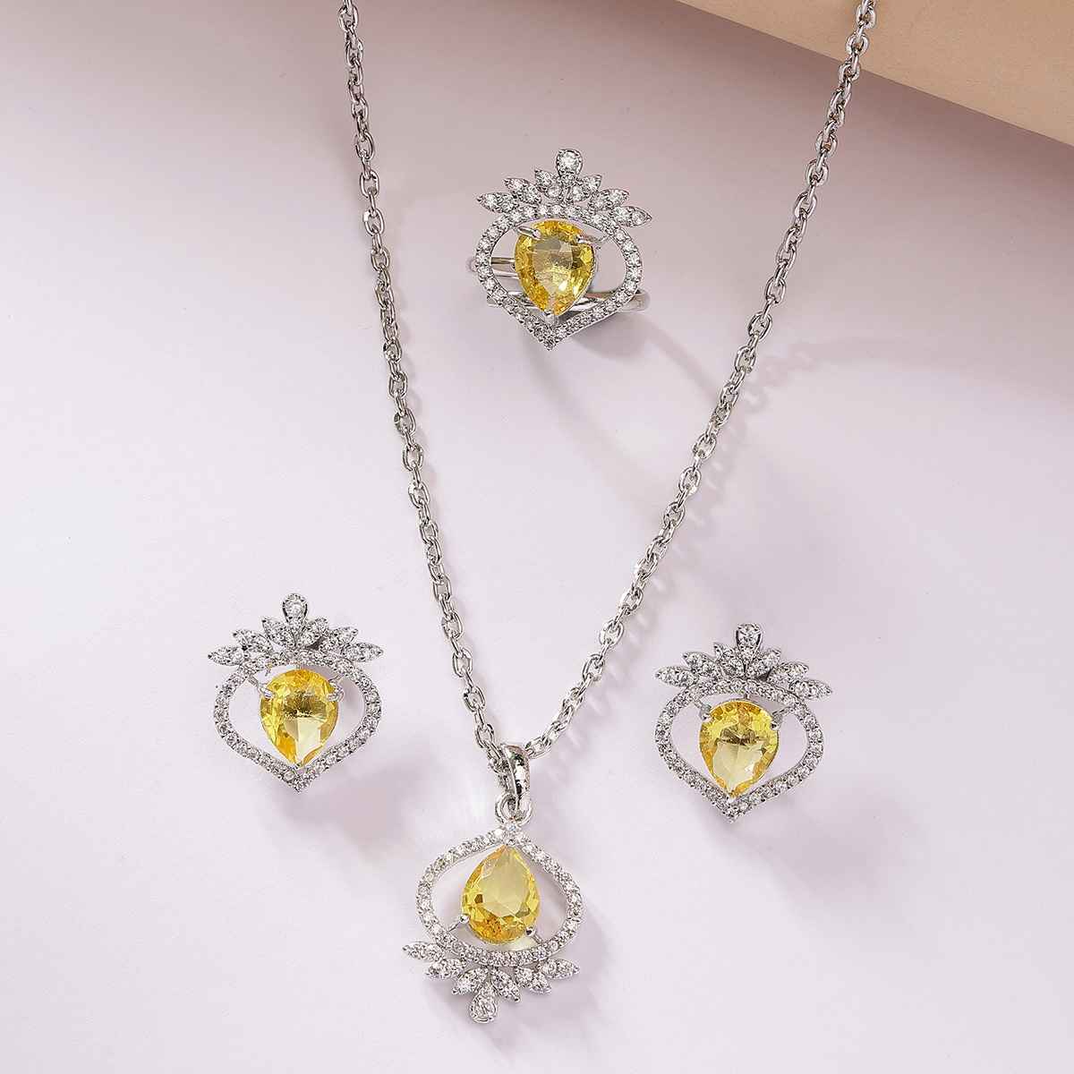 Zeneme Silver-Plated AD Studded Trilliant Crystal Yellow Necklace Earrings Ring For Women & Girls