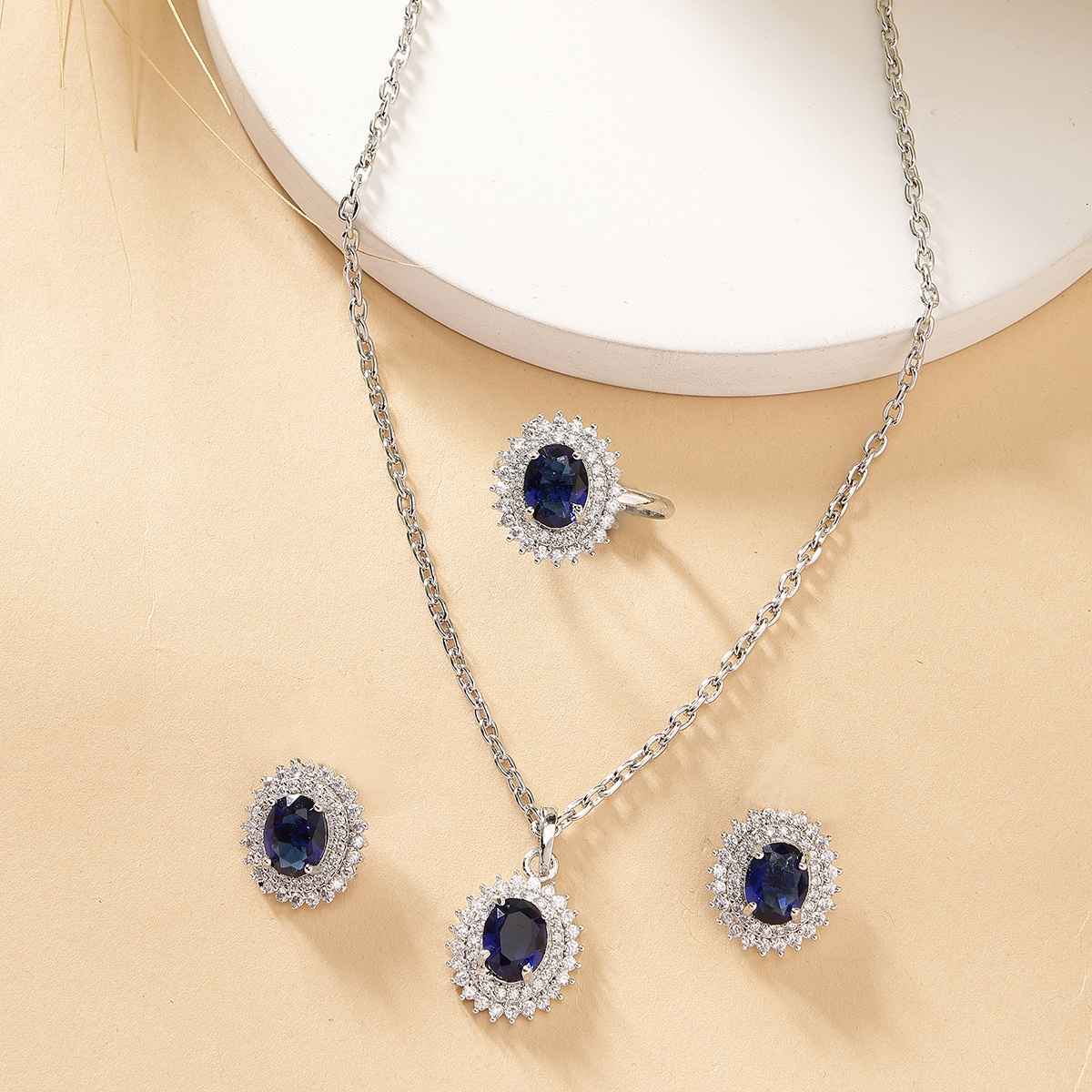 Zeneme Rhodium-Plated Blue AD-CZ Oval Halo Necklace Earrings Ring For Women & Girls