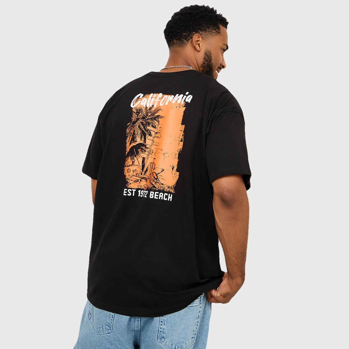 Styli Men's Tropical Back Graphic Printed Oversized T-shirt | Black - M