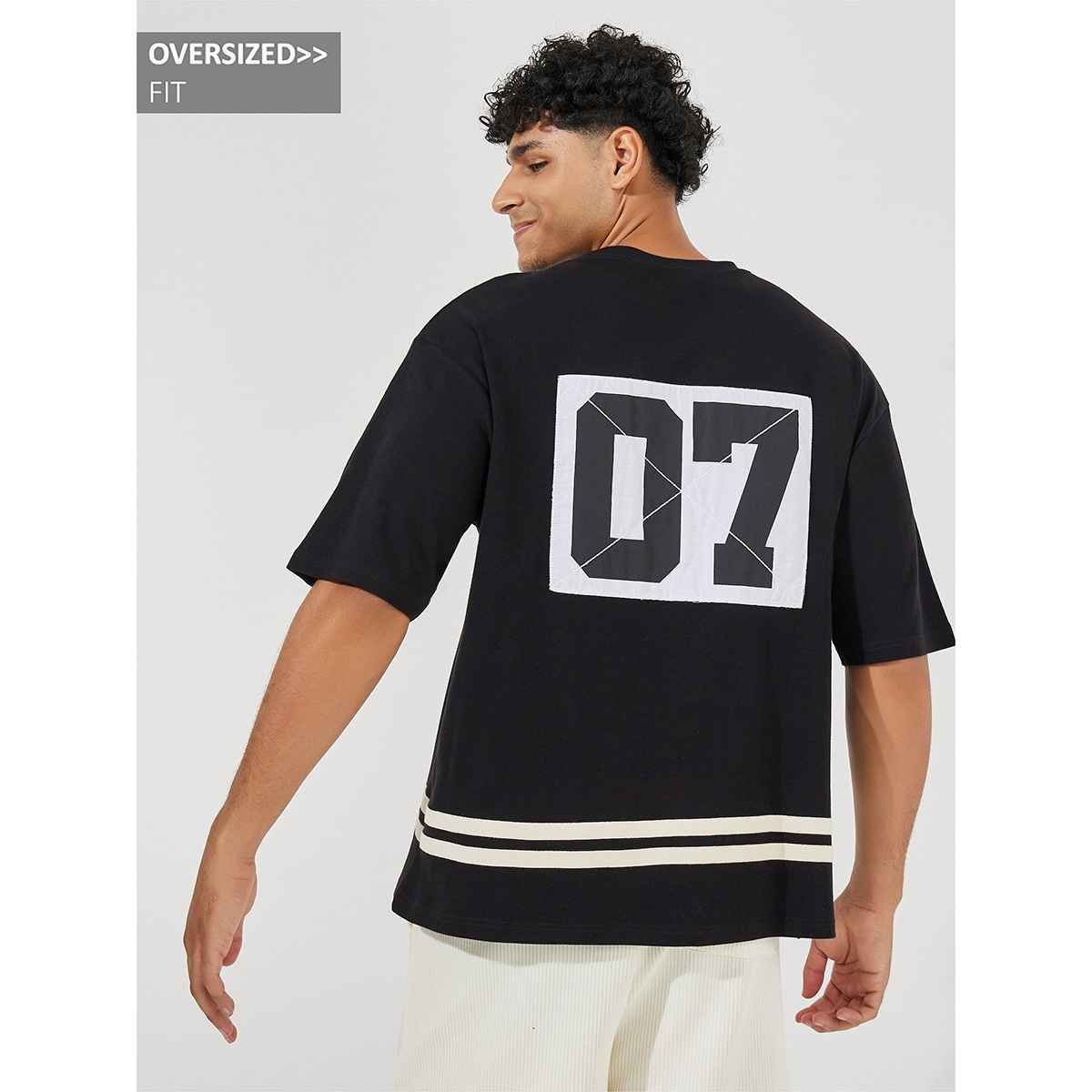 Styli Men's Oversized T-shirt with Striped Hem and Back Printed Panel | Black - S