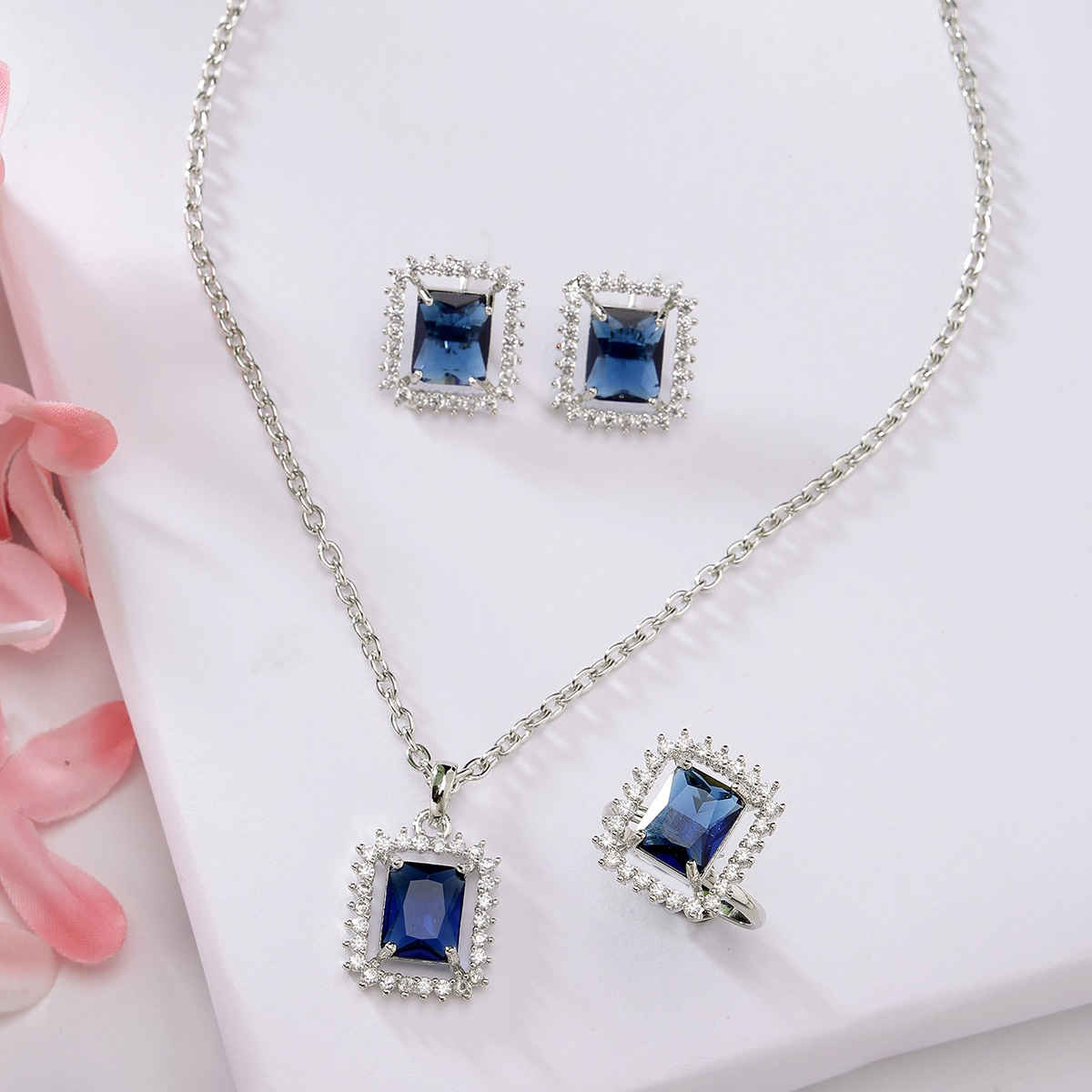 Zeneme Rhodium Plated AD Studded Princess Cut Crytsal Blue Necklace Earrings & Ring For Women