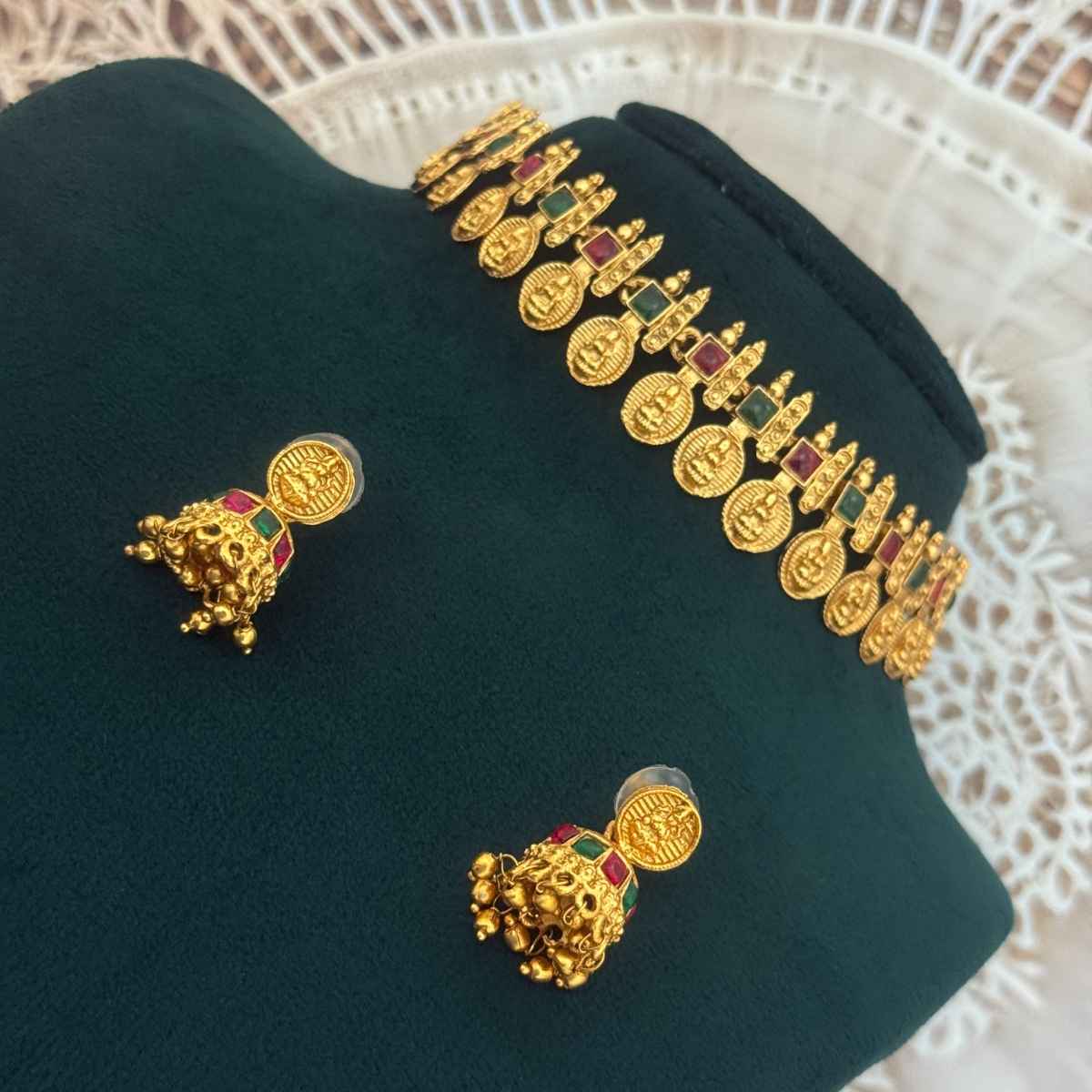 The Opal Factory Choker Necklace Set Laxmi Coin Motifs | Red and Green Stone Work & Jhumki Earrings