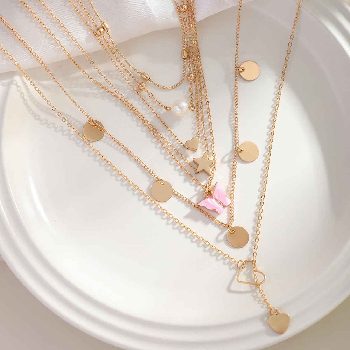 Jewels Galaxy Gold-Plated Gold-Toned Pack Of 7 Butterfly Layered Necklace (1 Pack 7 Necklaces)