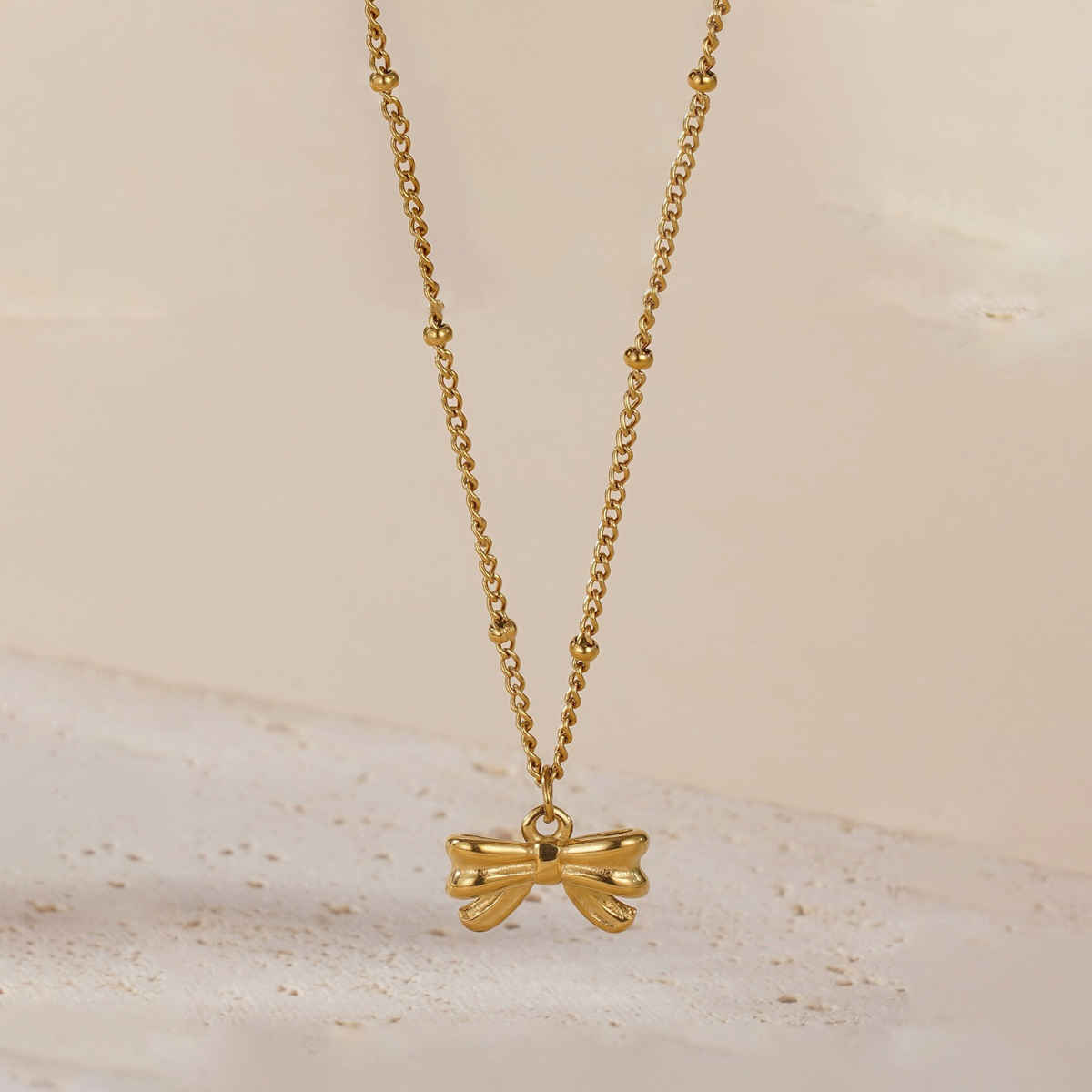LabelShe Gold Plated Stainless Steel Bow Themed Pendant | LS-PS-26455