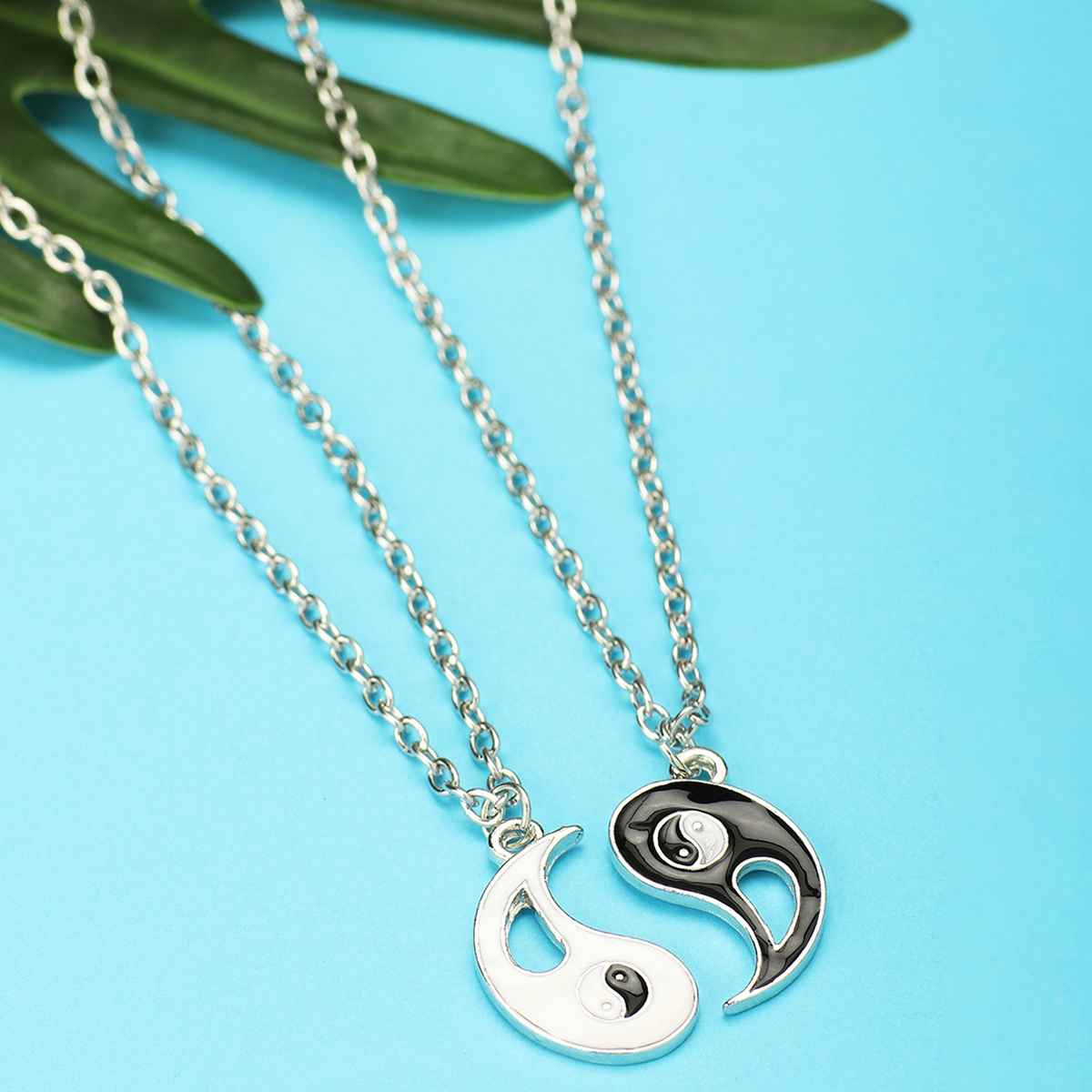 Peora Stainless Steel Yin Yang Puzzle Matching Pendant Couples Necklace Chain for Women - Pack of 2