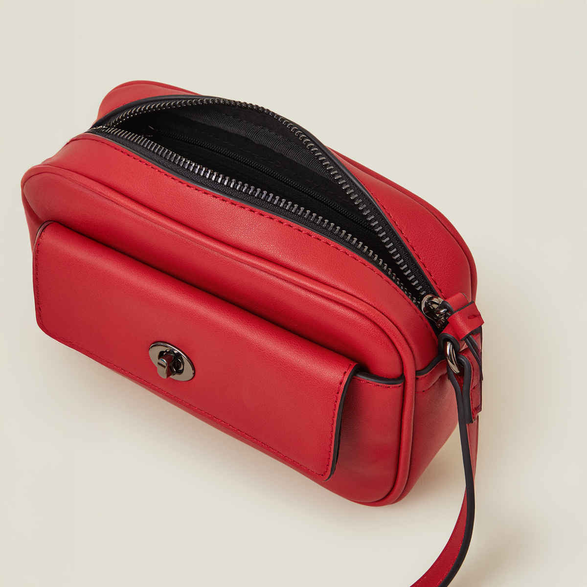 Accessorize London Women's Twist Lock Pocket Sling Bag | Red