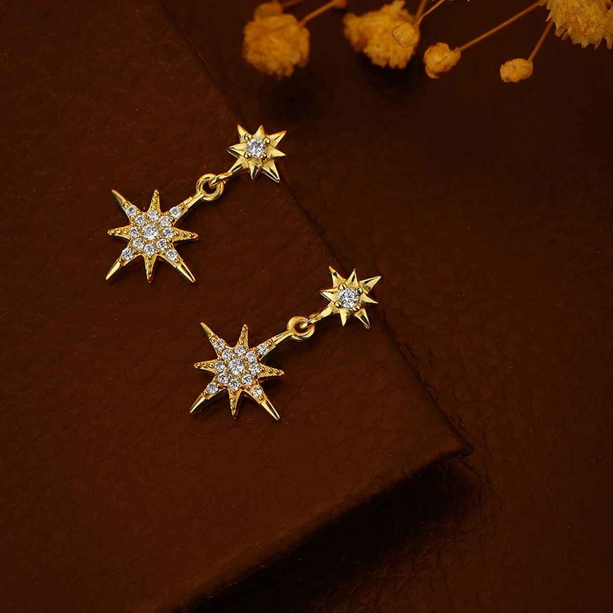 Buy Carlton London 18kt Gold Plated with CZ and Burst Star Drop Earring ...