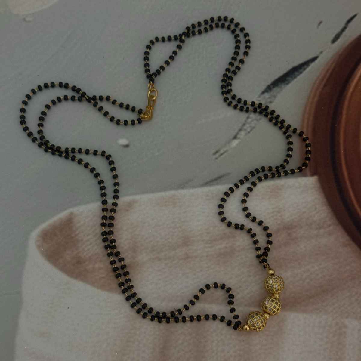 The Opal Factory Mangalsutra Double Line Golden Round Beads Pendant | Gold