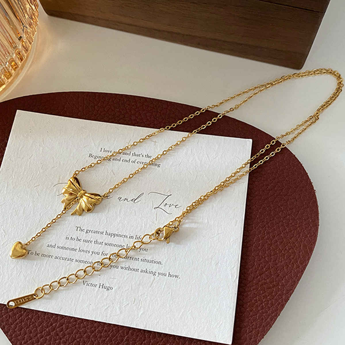 LabelShe Gold Plated Stainless Steel Heart Themed Bow Inspired Necklace | LS-NCK-67028