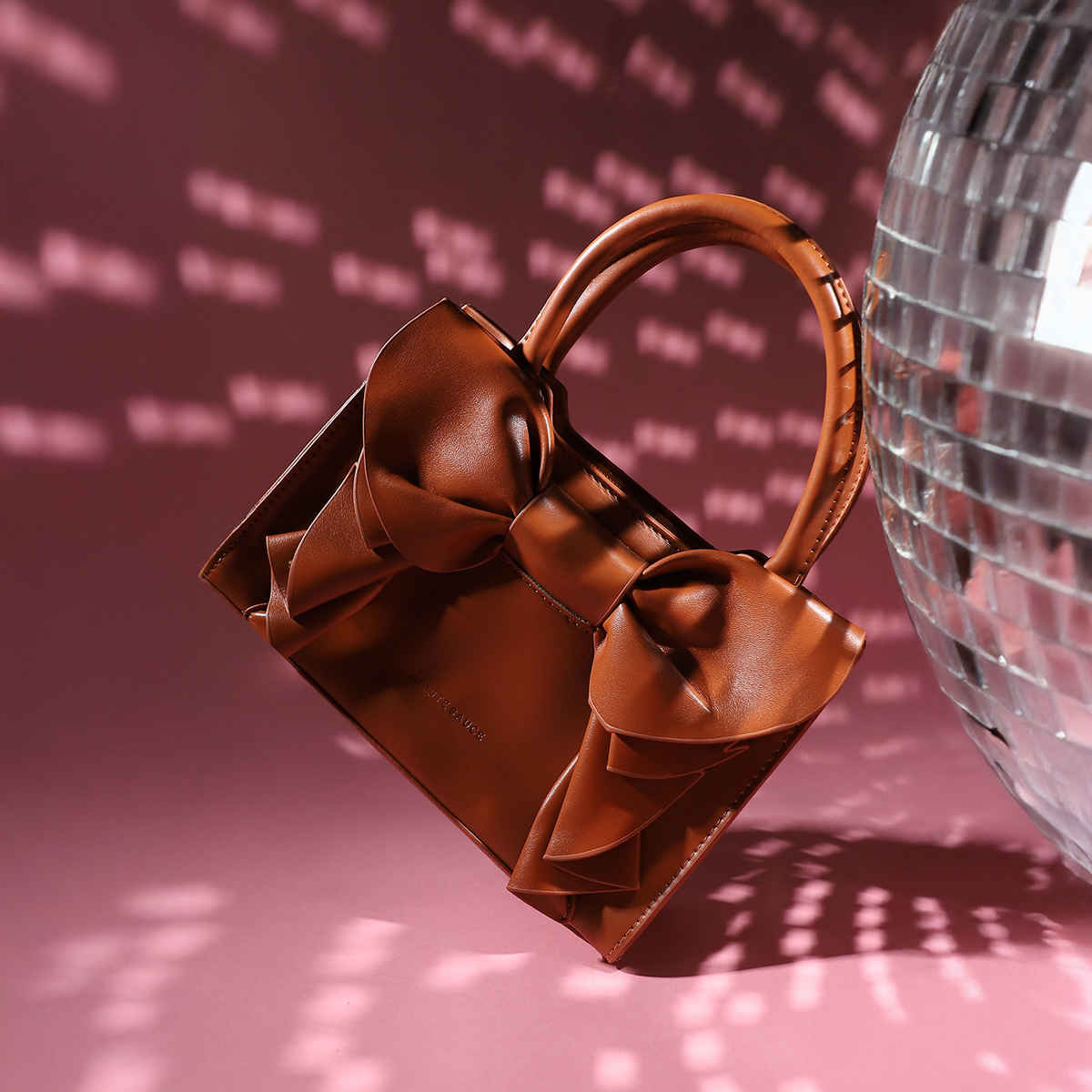 Haute Sauce Women's Solid Vegan Leather 2.7 L Handheld Bag | Brown - MInchesi