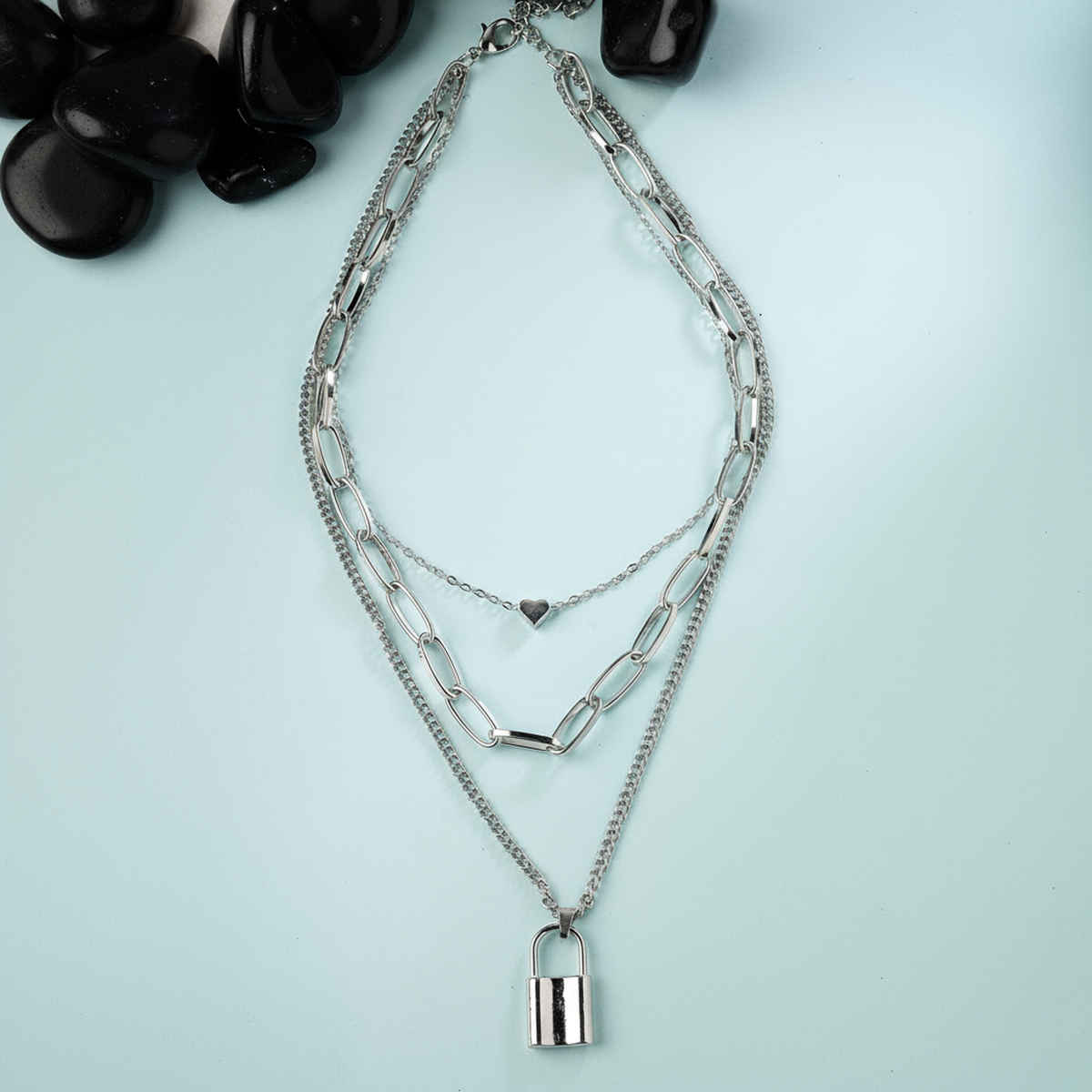 Scintillare By Sukkhi Western Style Rhodium Plated Silver Heart Lock Pendant Necklace