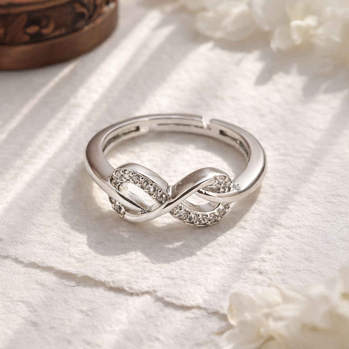 Sukkhi Latest Rhodium Plated CZ Infinity Valentine Finger Ring for Women|Free Size|LR116220