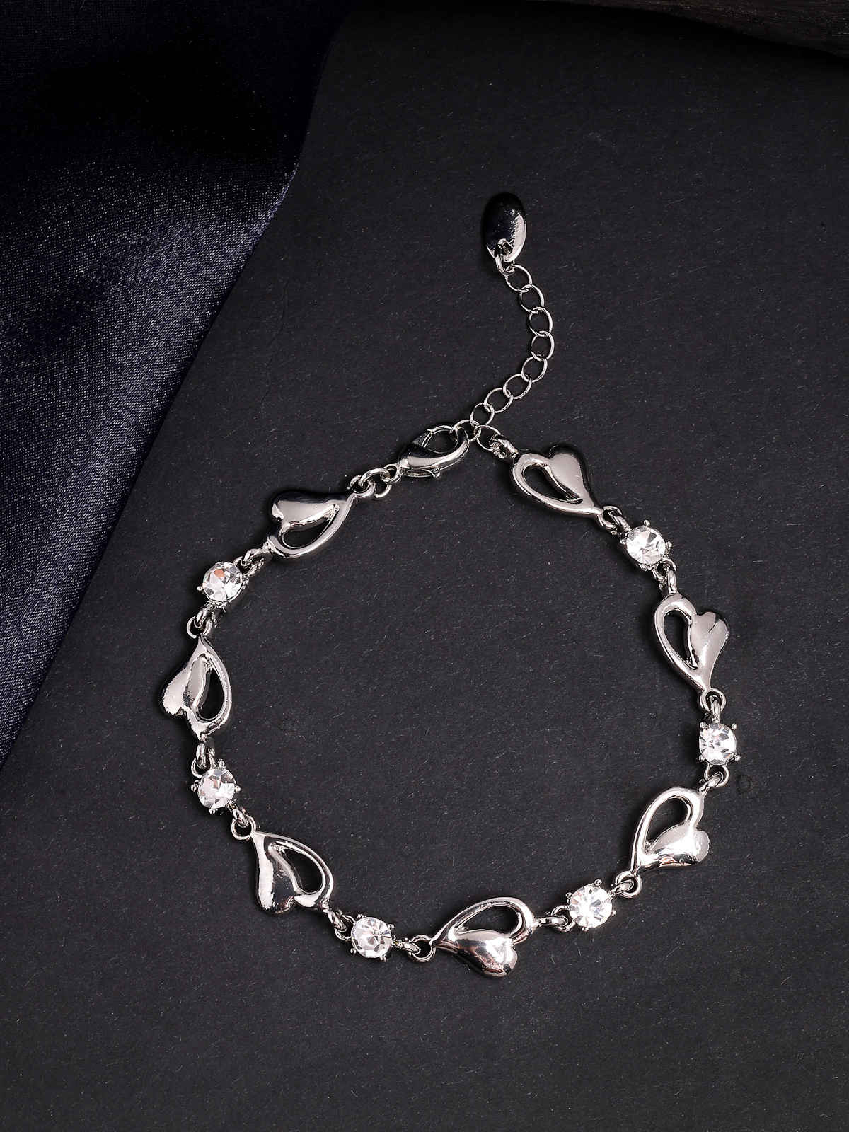 Scintillare By Sukkhi Crystal Stone with Platinum Plated Heart Shaped Bracelet Jewellery For Women