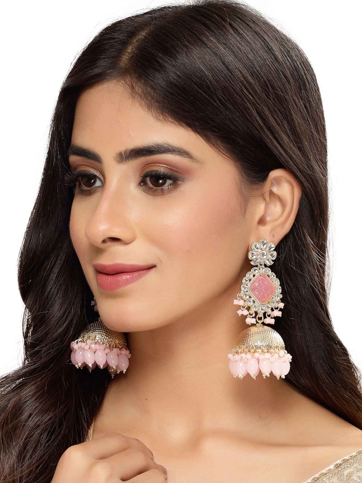 Sukkhi Decent Gold Plated Pink Kundan Studded Jhumka Earrings for Women