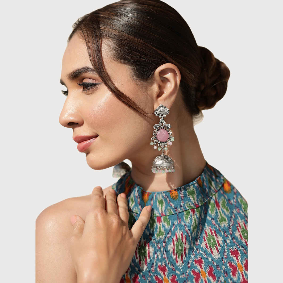 Rubans Silver-Plated Oxidised Jhumka Earrings with Pastel Pink Gemstone and Mint Green Beads