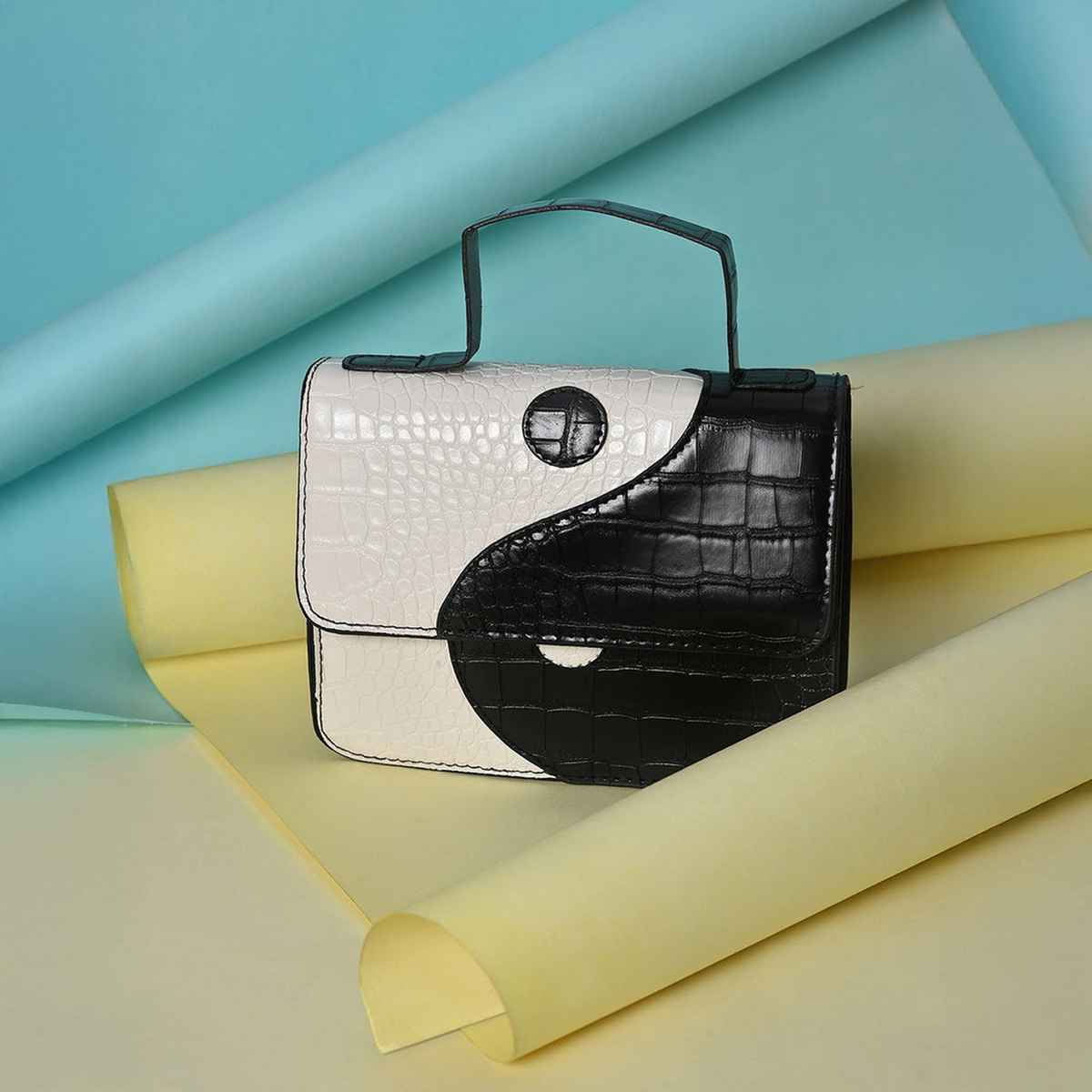 Haute Sauce Women's Textured PU 2 L Satchel | Multicolour