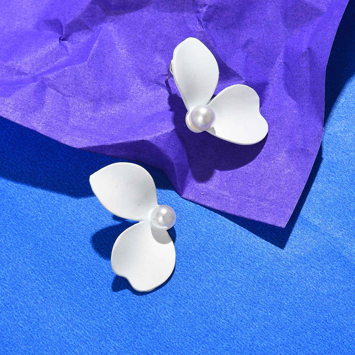 Sohi White Contemporary Studs Earrings