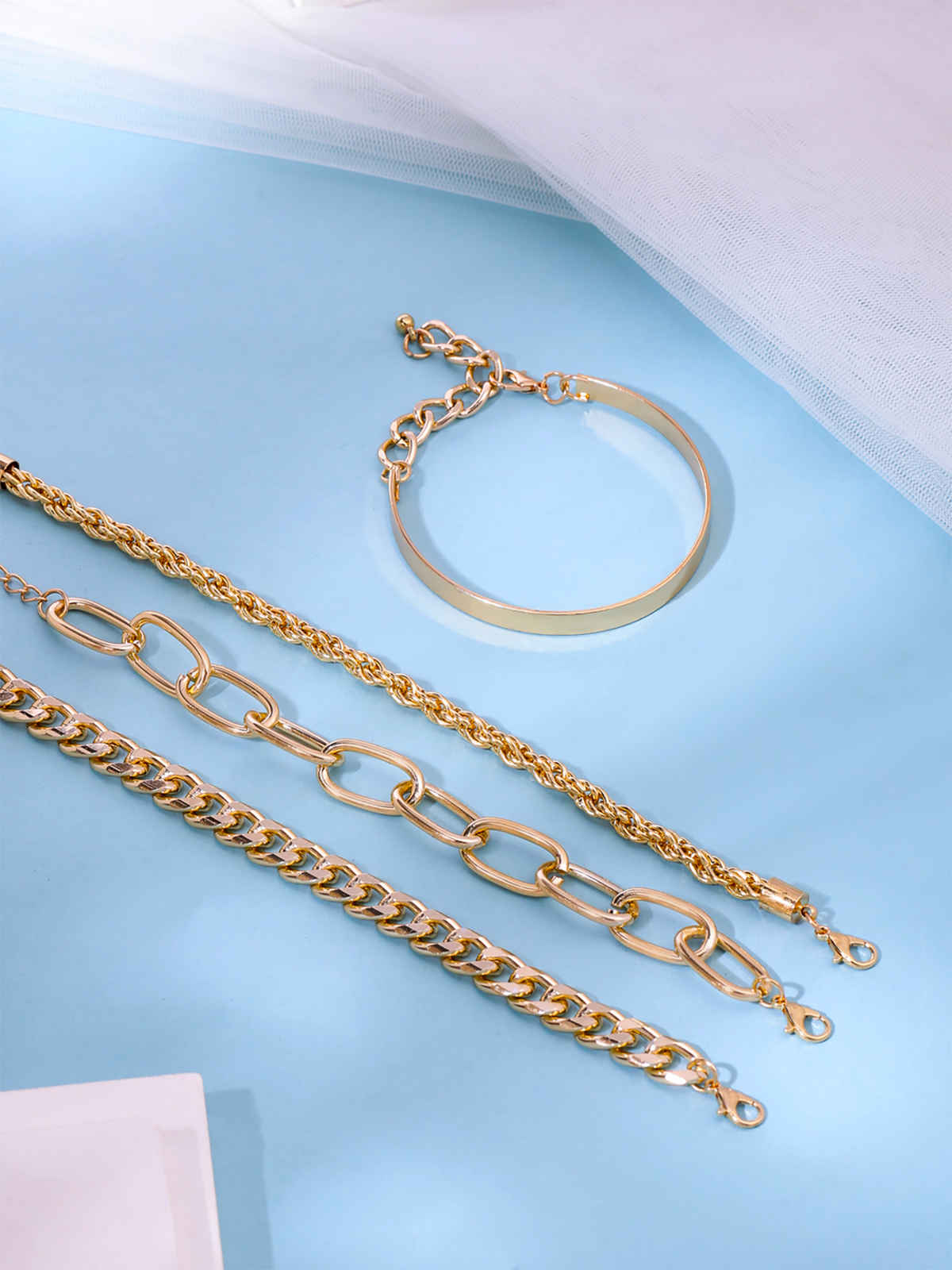 Yellow Chimes Women Set Of 4 Combo Multilayer Stack Style Chain Bracelets