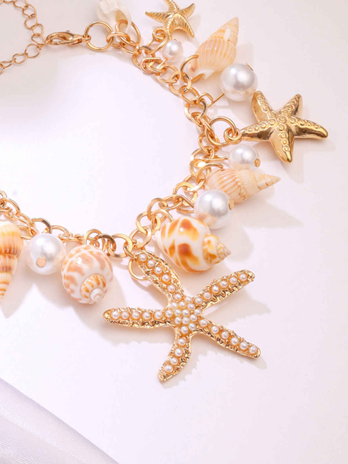 Yellow Chimes Women Gold-Toned Sea Shell Starfish & Pearls Hanging Charm Bracelet