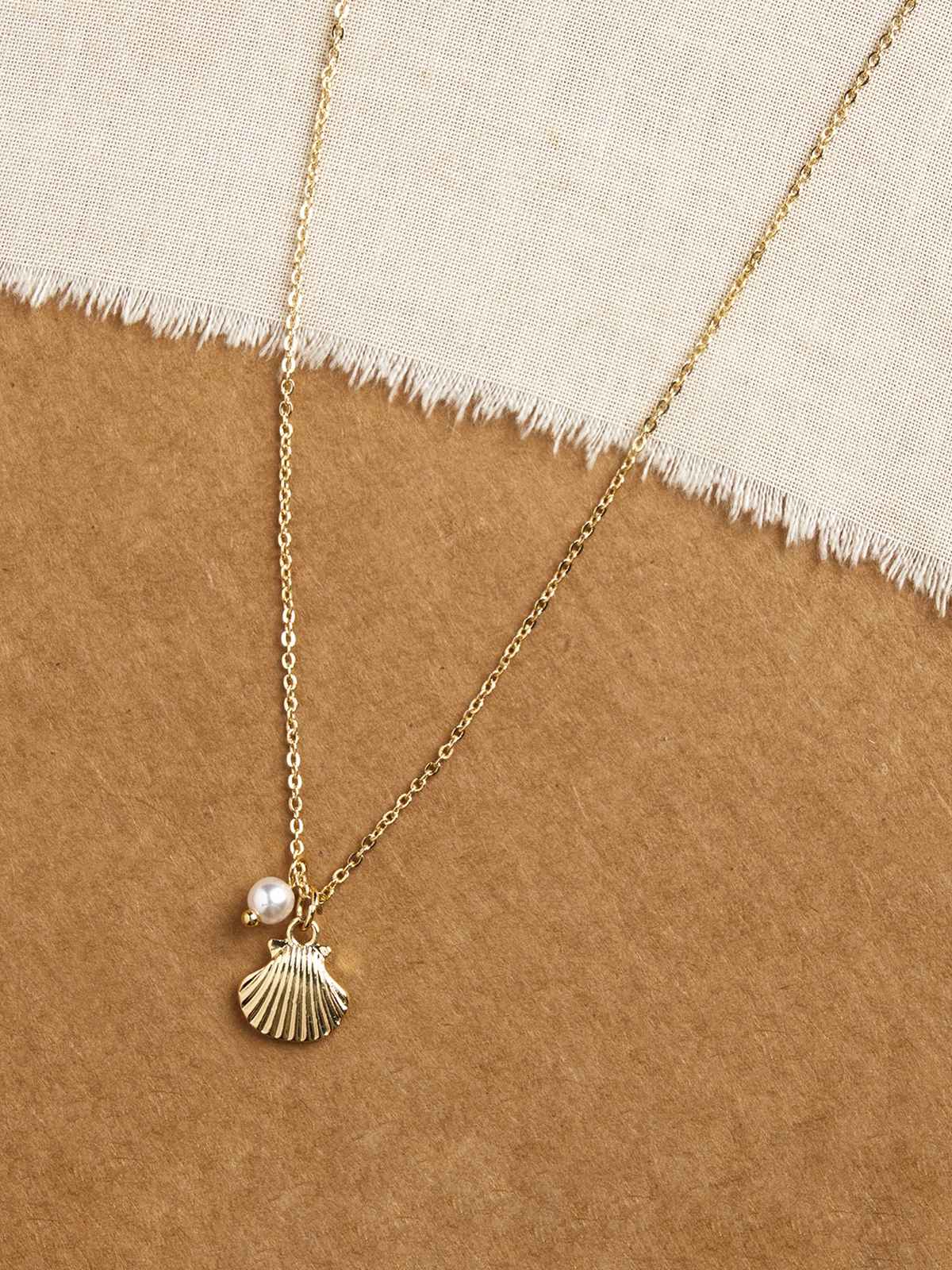 Accessorize London Women Gold Pearly Shell Pendant Necklace