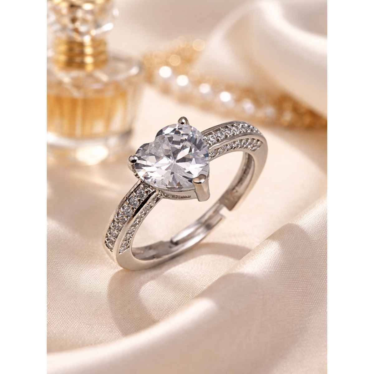 Sukkhi Stylish Rhodium Plated CZ Solitaire Heart Shaped Love Proposal Ring for Women | Free Size