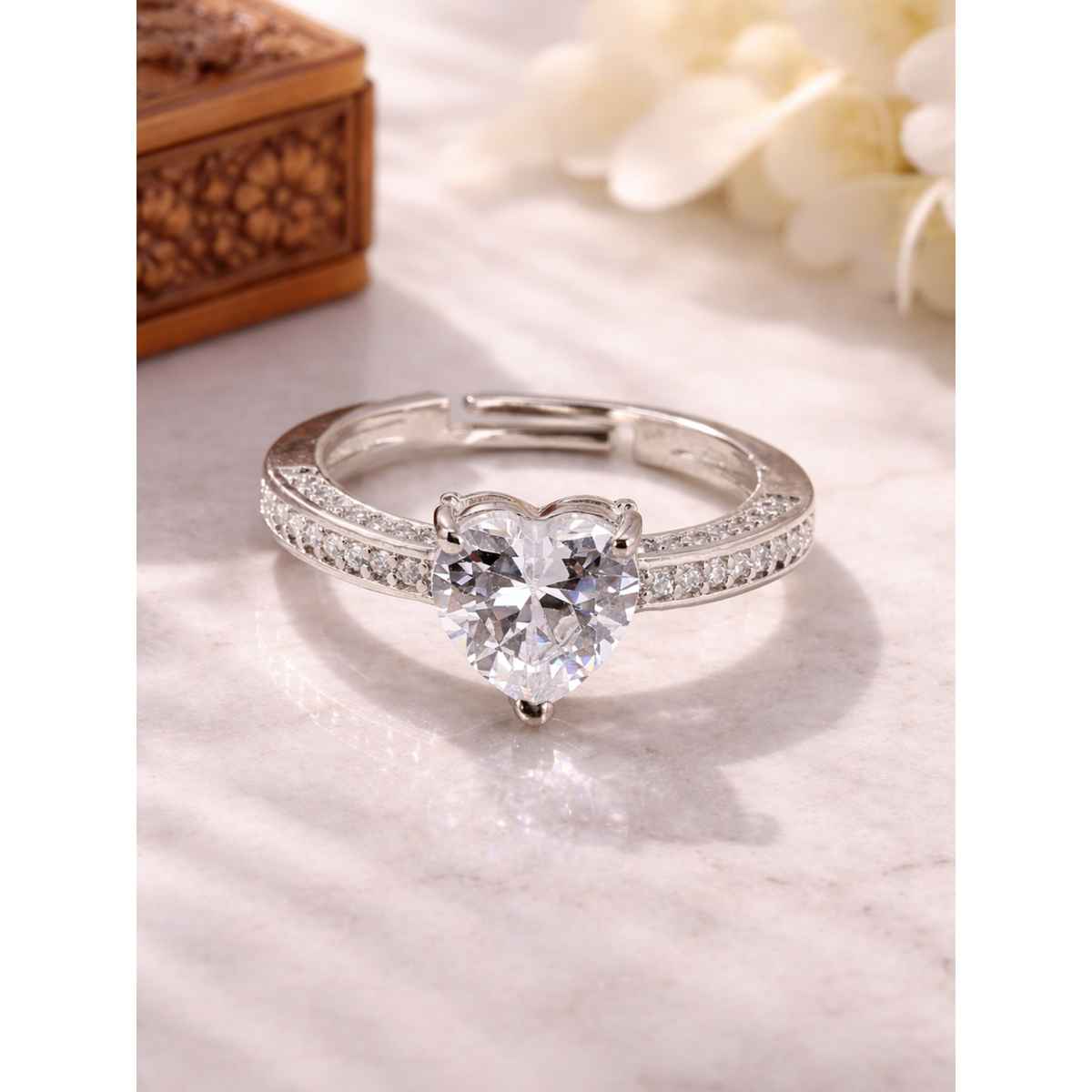Sukkhi Stylish Rhodium Plated CZ Solitaire Heart Shaped Love Proposal Ring for Women | Free Size