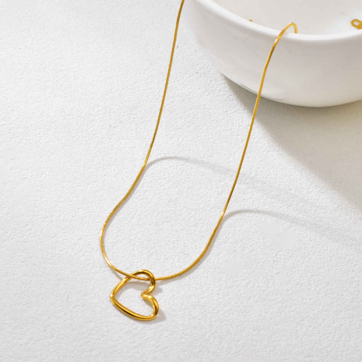 Beautynx Golden Love Knot Necklace | Gold | BNX-NK-0003