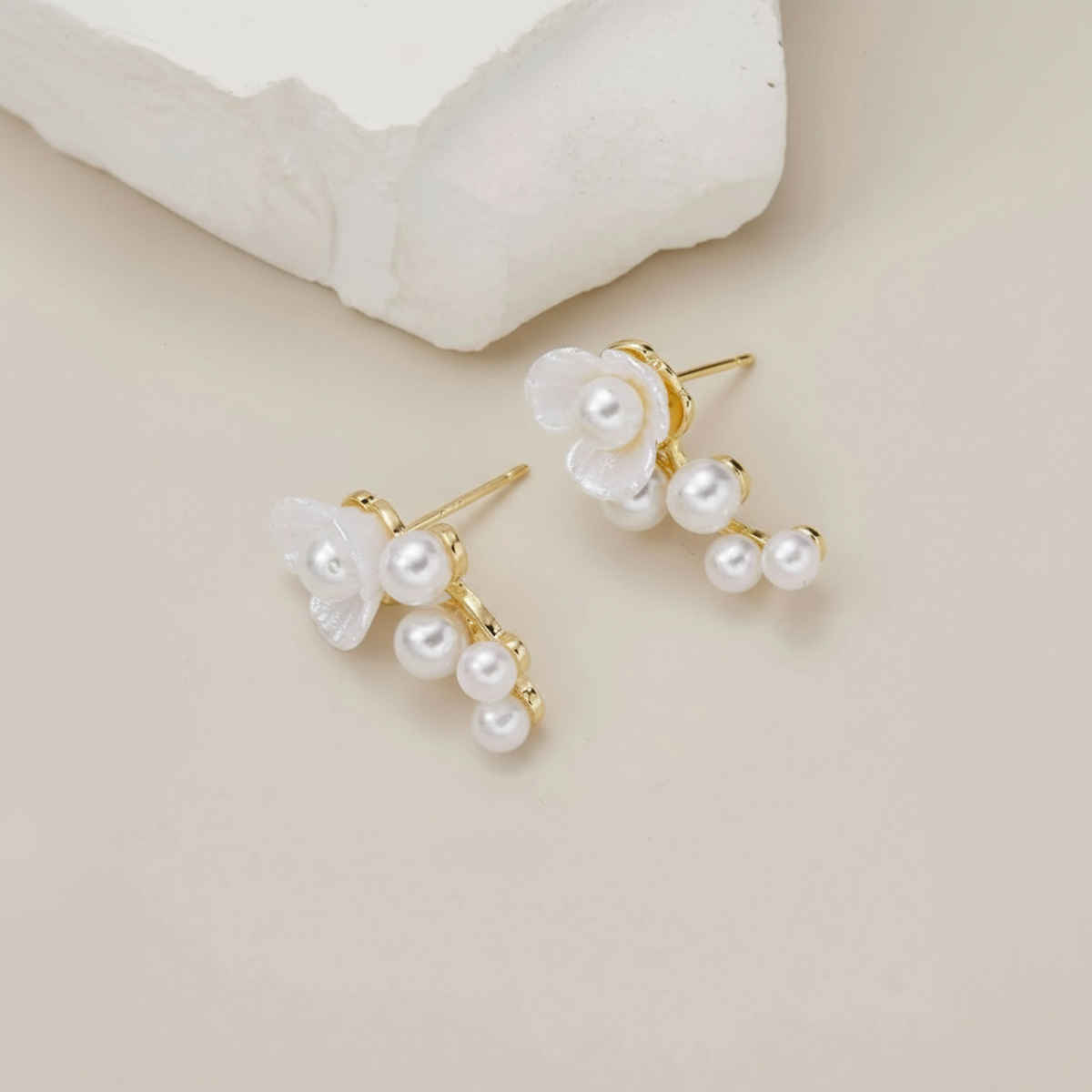Unwind by Yellow Chimes Gold Plated White Pearl Stud Earrings